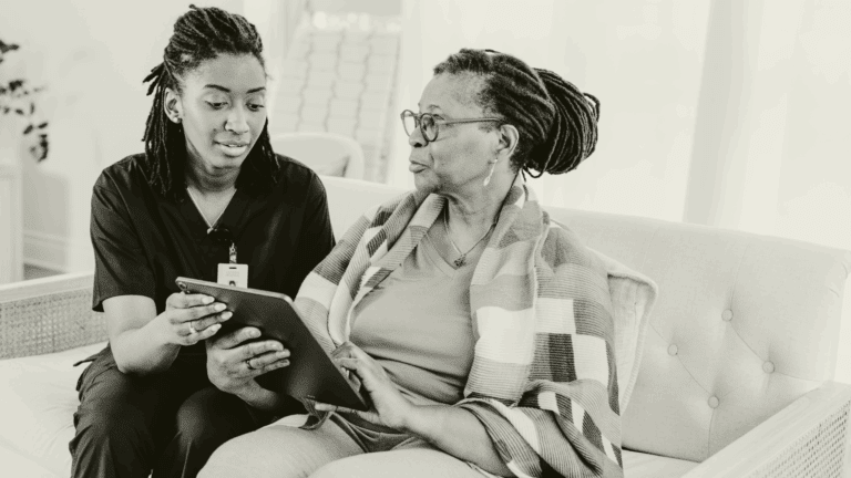 Primary care locum clinician supporting a patient during a consultation, demonstrating professionalism and patient-centred care.