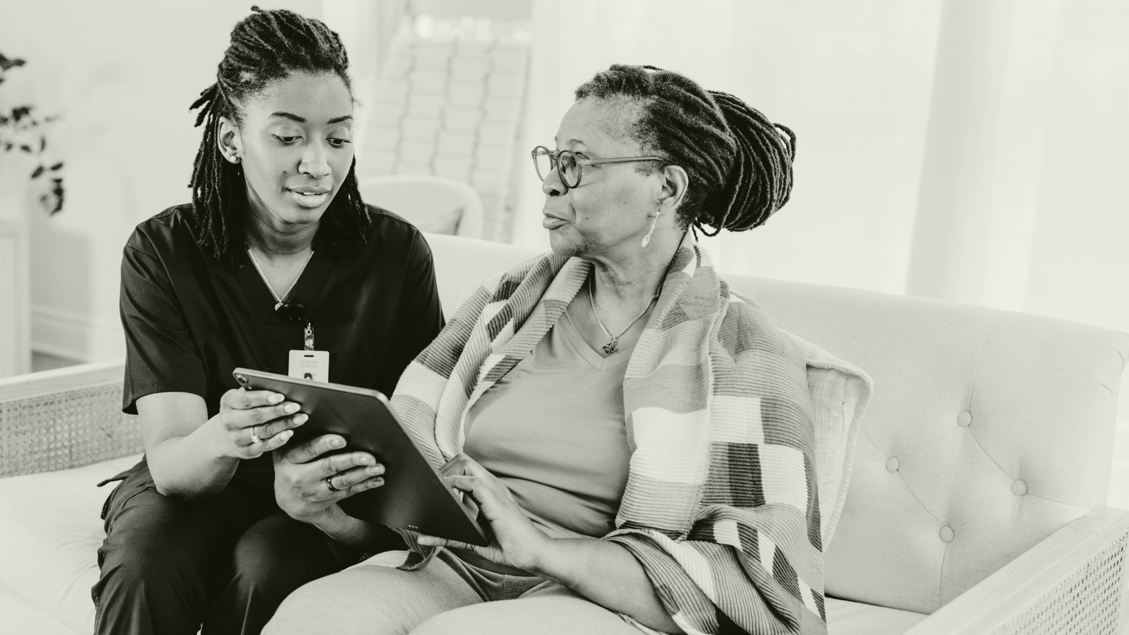 Primary care locum clinician supporting a patient during a consultation, demonstrating professionalism and patient-centred care.