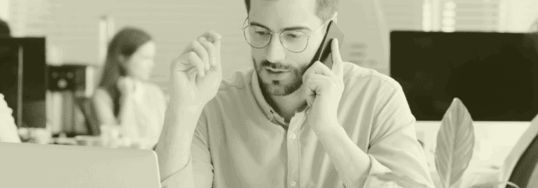 Primary Care recruiter on the phone discussing clinical staffing needs in a healthcare office